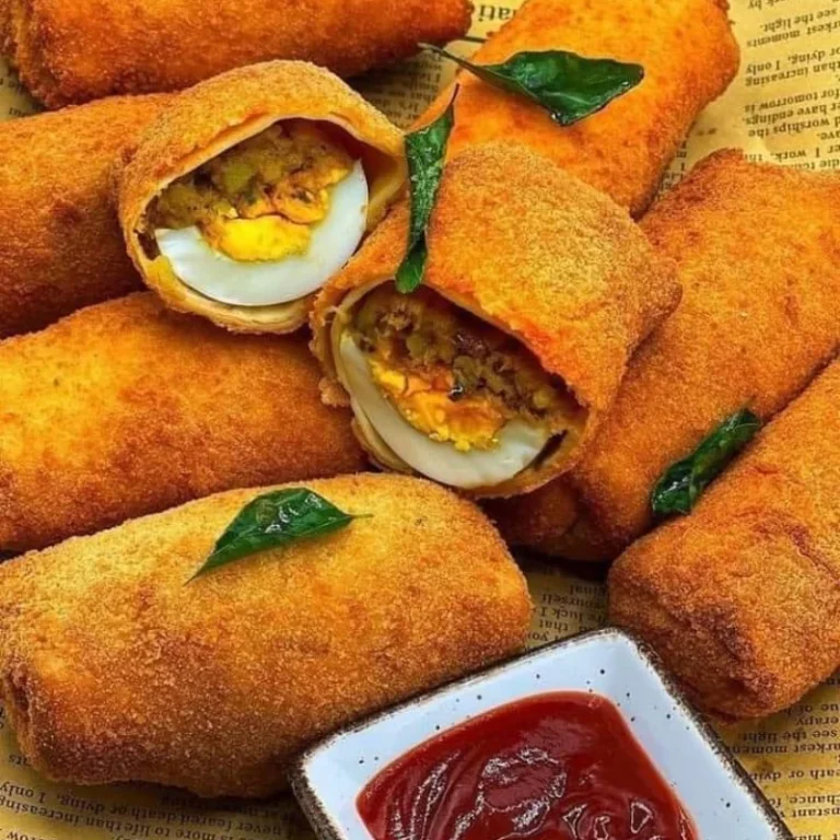 Spicy Fish Roll - A Fusion of Flavorful Fish, Potato Mash, Boiled Egg, and Crunchy Goodness